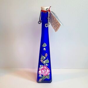 Hand painted cobalt blue bottle.